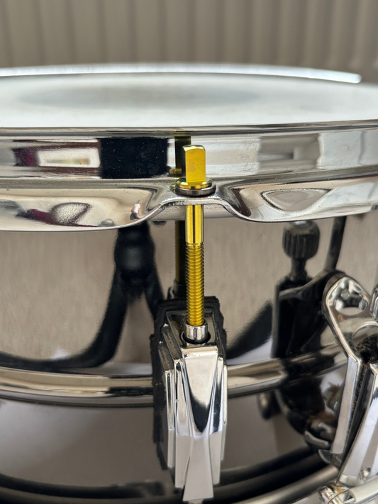 Custom titanium tension rod on snare drum