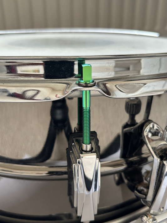 Custom titanium tension rod on snare drum